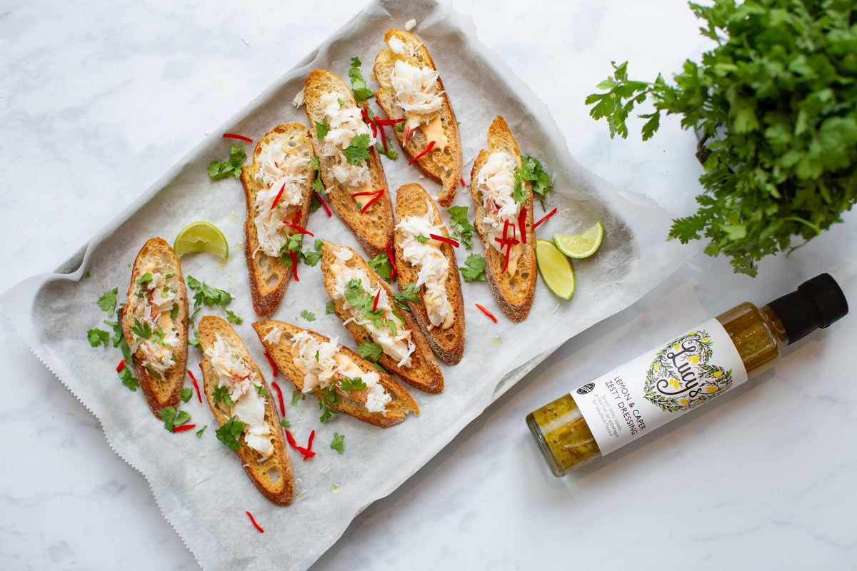 Crab Crostini with Lucy's Lemon and Caper Zesty Lucy's Dressings